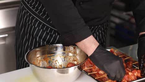 preparing marinated pork skewers