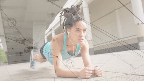 red de conexiones contra mujer afroamericana haciendo ejercicio de tabla en el parque