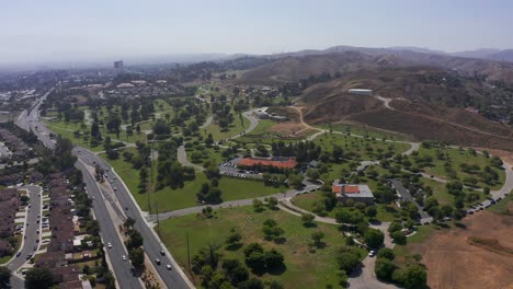 aerial wide descending shot of an expansive mortuary in california
