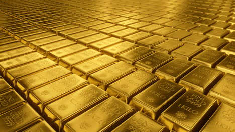 Seamless-3D-animation-of-the-high-value-gold-bars-stacked-abreast.-The-camera-is-slowly-moving-sideways-in-an-endless-loop.-Realistic-shining-and-light-reflecting-golden-ingots.-Loopable-animation.-HD