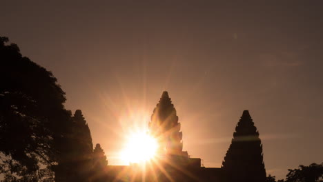 angkor wat sunrise star burst with copy space - vertical