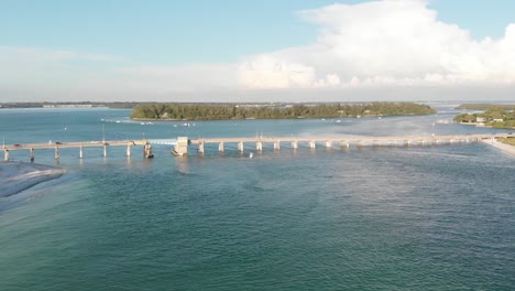 the strong blue currents of longboat pass sweep below the longboat key pass bridge