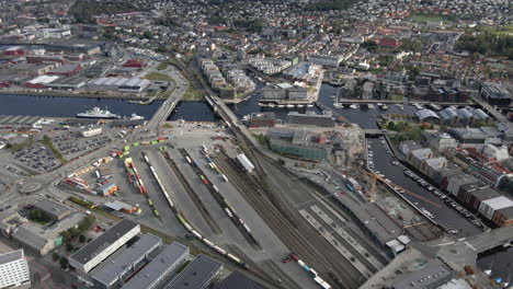 Cityscape-And-Harbor-In-Trondheim,-Norway---aerial-drone-shot