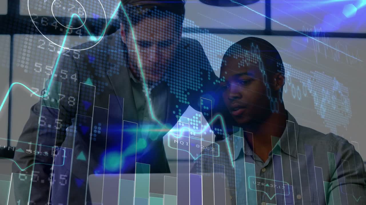 Seated analyst typing as standing manager leaning in, pointing at laptop, reviewing finance charts