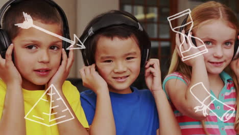 animation of school icons over diverse schoolchildren using headphones in classroom