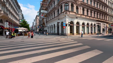 vienna, austria - june 9, 2025: crossroads and the street of modern vienna, austria. cars and busses go by the road