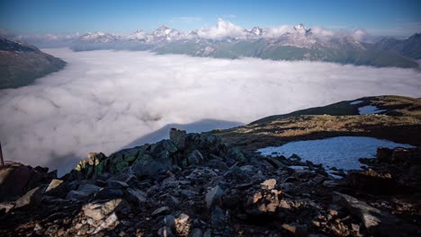 panoramic-wide-angle-timelapse-of-a-dynamic-layer-of-morning-fog-moving-in-Oberengadin-valley-seen-from-Segantini-Hut-above-Pontresina-in-directon-of-Maloja-Pass