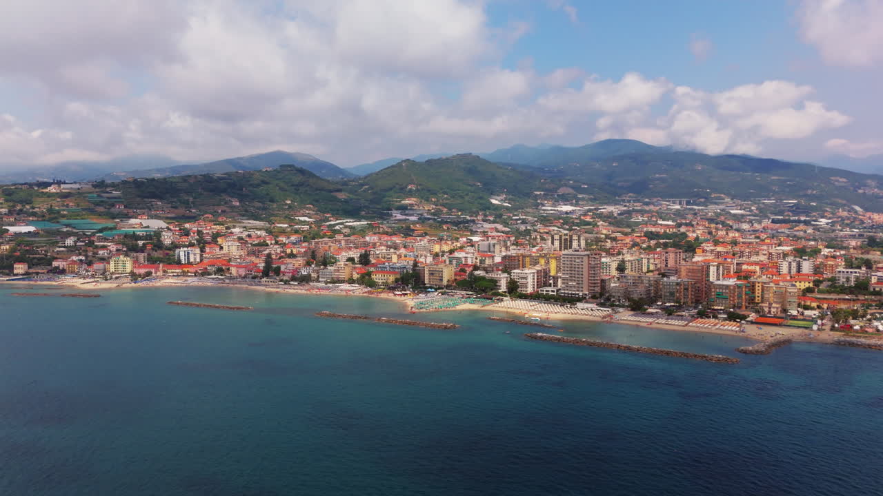 A beautiful town in liguria, italy, with clear mediterranean waters, aerial view