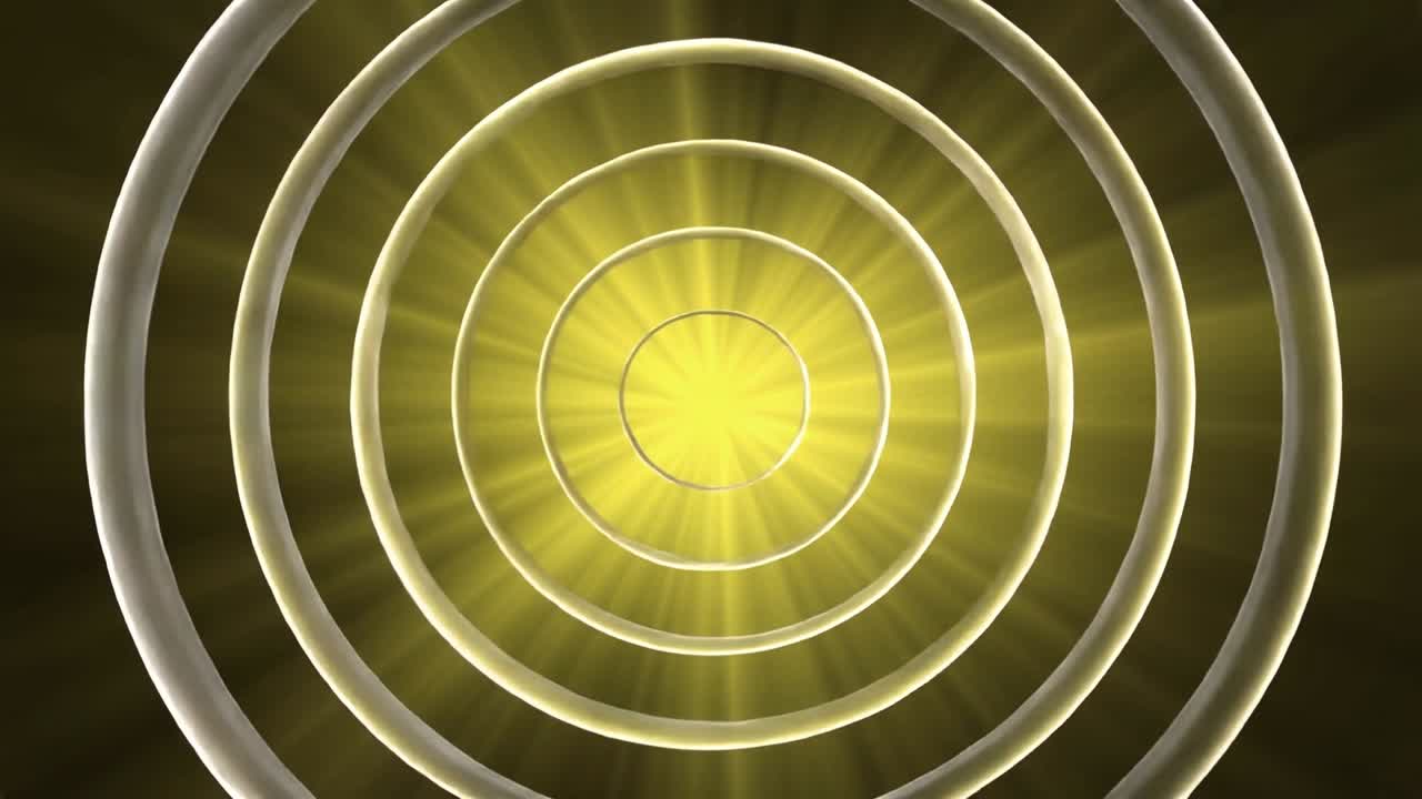 Concentric rings animating as frames play, yellow core glowing, rays growing for tech demo