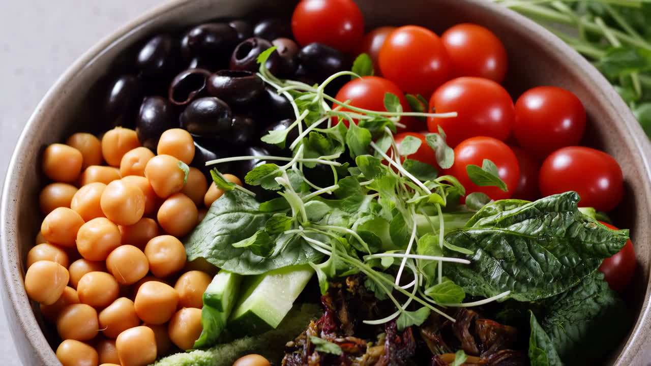 Vibrant and Healthy Salad Bowl with Chickpeas, Olives, and Cherry Tomatoes