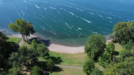 aerial view of ground then water at keuka lake park in the finger lakes, ny