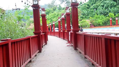 scenic view of a red pedestrian bridge