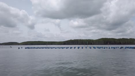 crossing water and passing an oyster farm with