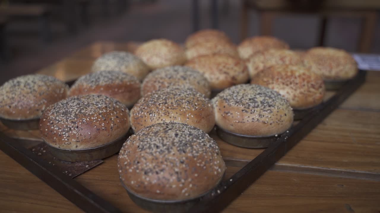Rising close up view of homemade burgers bun in the trey
