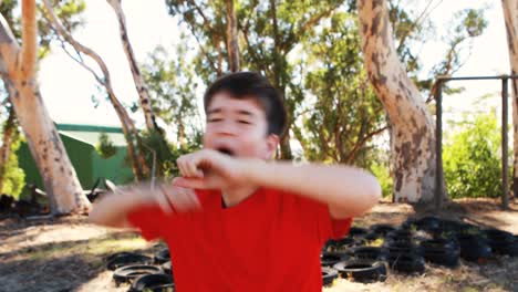 boy dancing during obstacle course