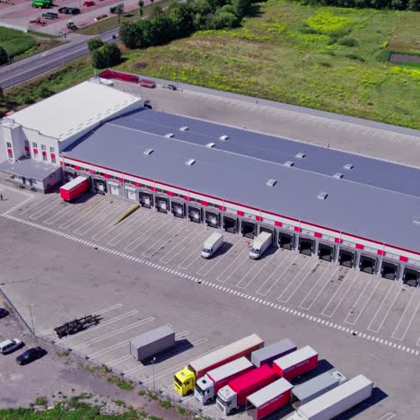 aerial view of a distribution center with trucks and trailers