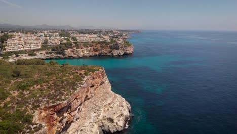 Antena:-Drone-Volando-Cerca-De-Los-Acantilados-De-La-Costa-De-Mallorca-En-Verano-Soleado