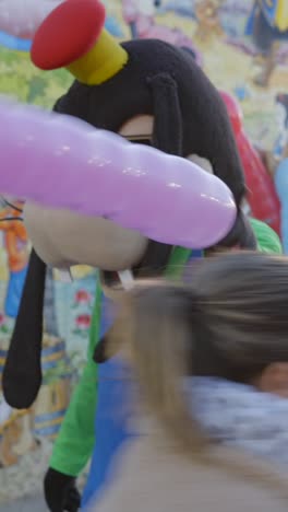 a goofy mascot character at an amusement park or event