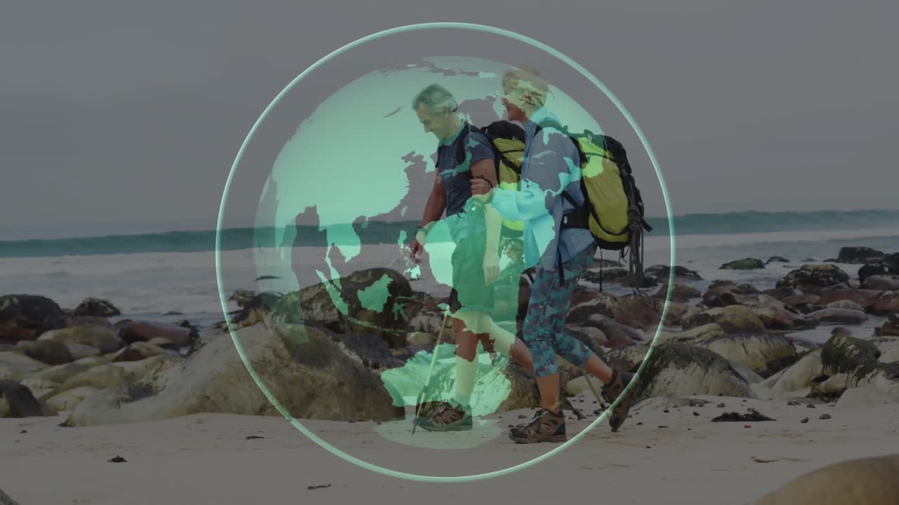 Sovrapposizione di un globo rotante che sfuma guidando gli escursionisti che camminano sulla spiaggia orientandosi tra le pozze di marea per i viaggi