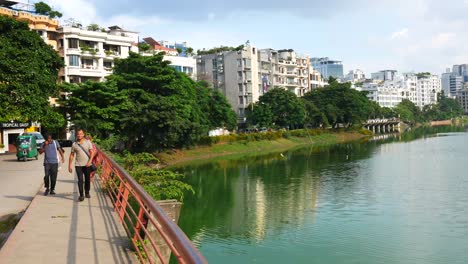 cityscape with lake and bridge in bangladesh