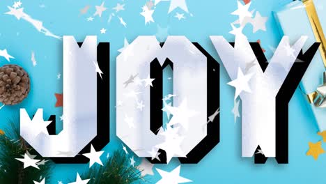 animation of joy text over stars falling and christmas decorations