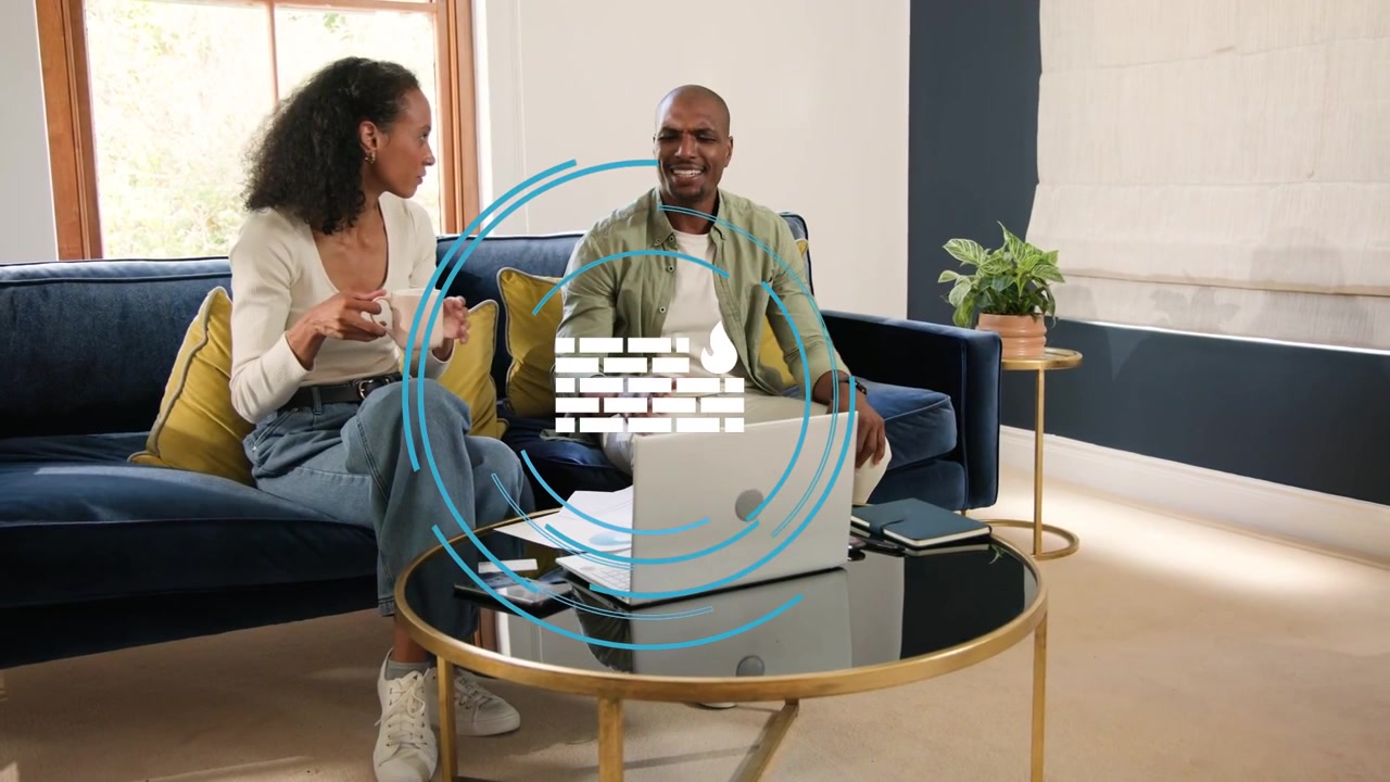 Vertical video: Overlay appearing on laptop, couple pointing at papers, checking system at home