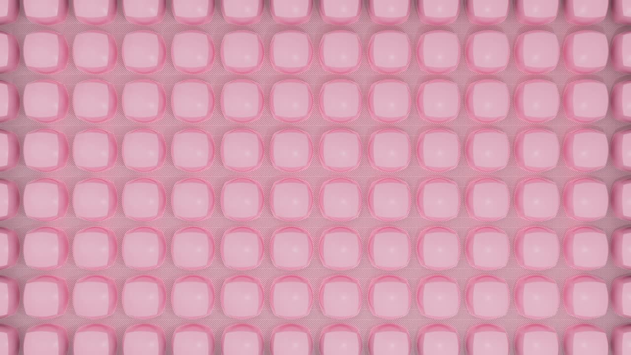 File di ovali lisci color pastello su superficie ruvida