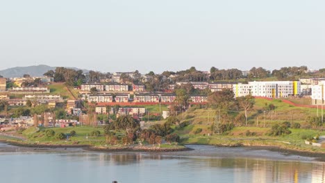 the aerial perspective showcases heron’s head park’s natural beauty nestled beside busy san francisco neighborhoods. filmed on a dji air 3s.
