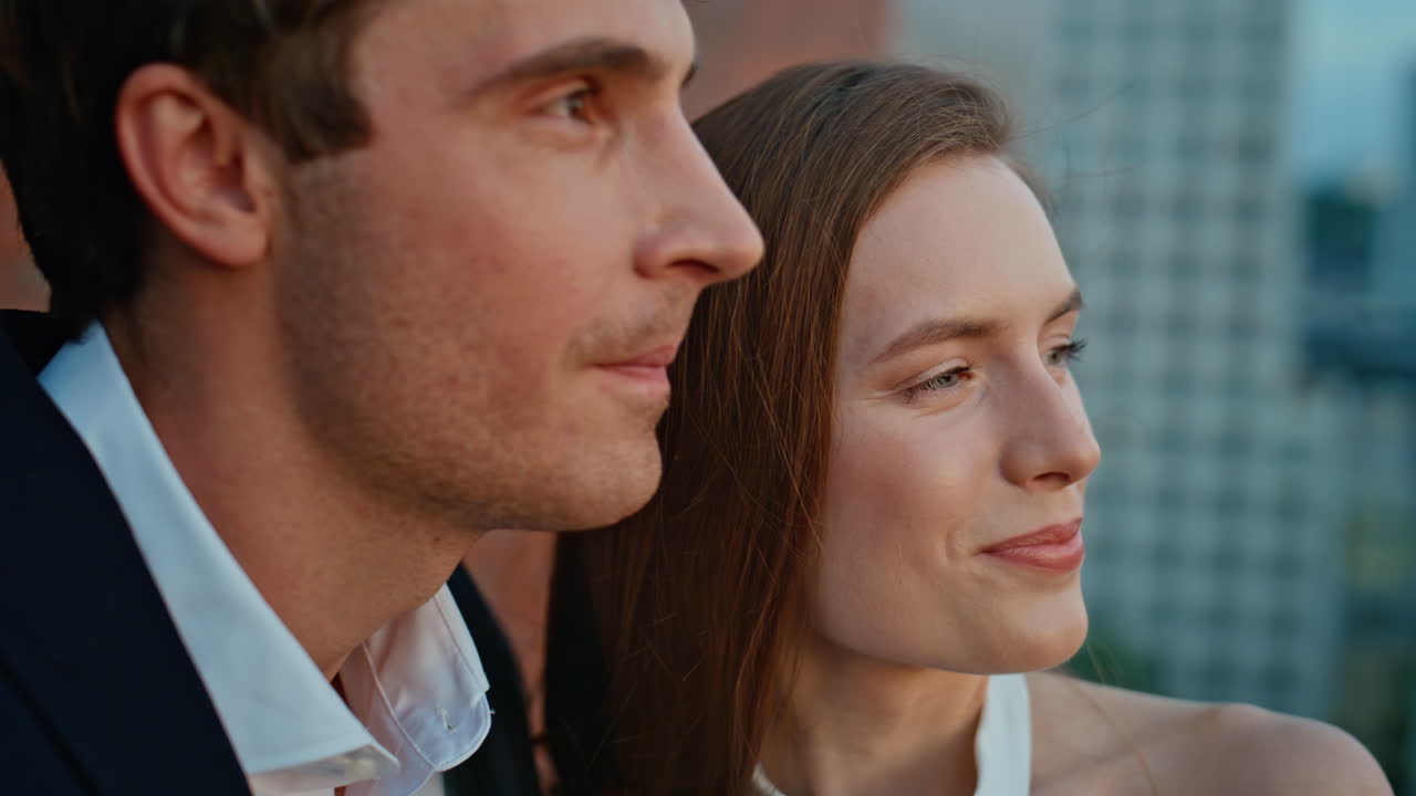 Closeup laughing couple enjoying cityscape spending romantic date on rooftop
