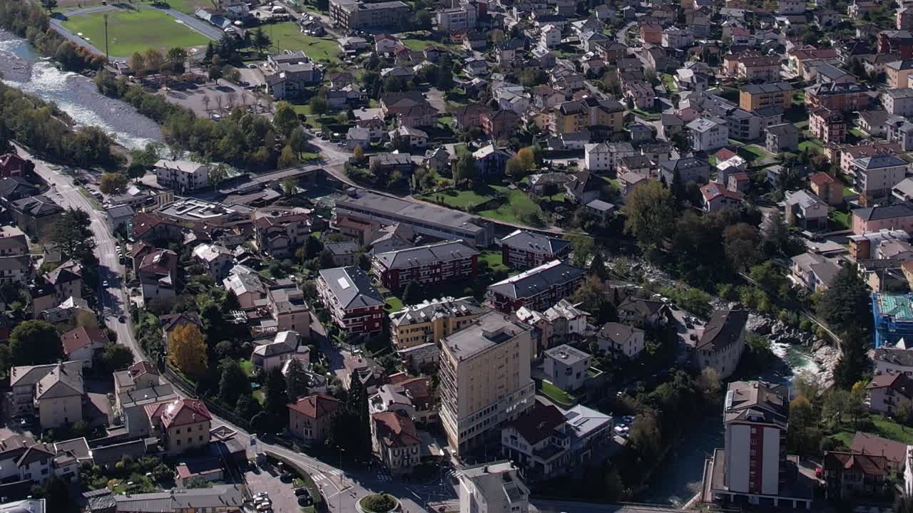 Drones capture stunning aerial views of Italian Alps and nearby town