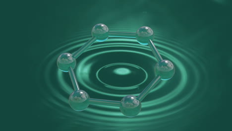 초록색 배경에 있는 분자의 마이크로 모델의 애니메이션