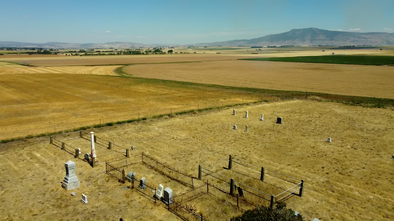 US, Oregon, La Grande, 2025-08-11 - Drone view of Ackles Cemetary with fields in the distance