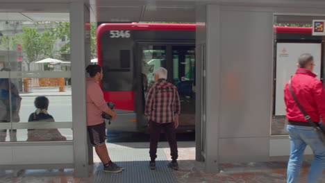 people at a bus stop