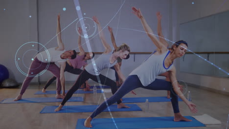 animation of data processing over group practicing yoga, meditating