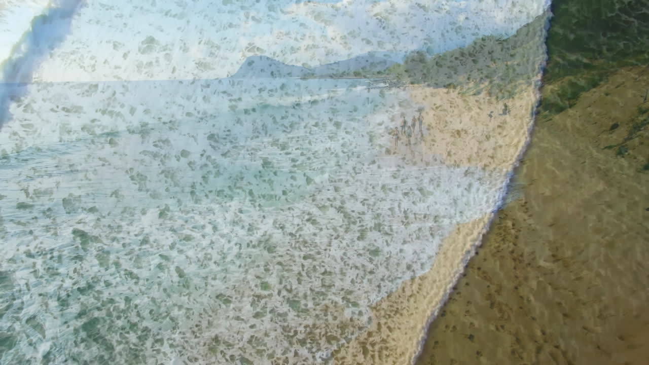 Ocean waves crashing on sandy beach with animation of leaves overlay