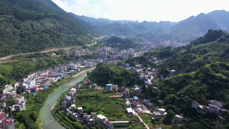 village aerial in hubei province, hefeng county, above the loushui river