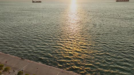 Magnificent sunset on the Aegean Sea with panoramic view of the horizon in the region of Thessaloniki, Thermaikos, Greece.