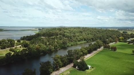 Drone-flying-next-to-the-Snowy-River-between-Marlo-and-Orbost,-in-Gippsland,-Victoria,-Australia,-December-2020