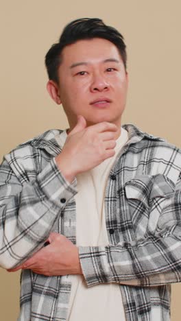 Man pondering imagining in mind wondering difficult solution feeling confused not sure about choice