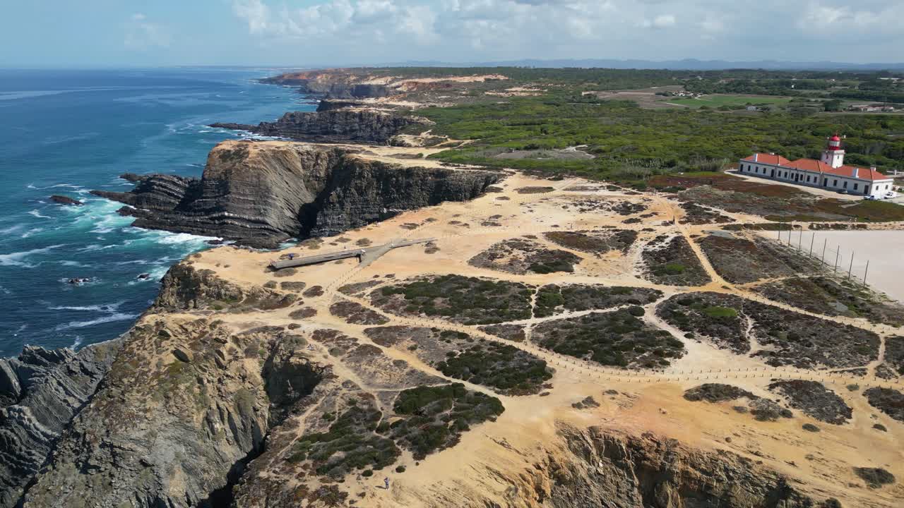 Scenic viewing platform atop coastal cliffs at Cabo Sardao lighthouse