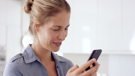 real woman using mobile phone at home drinking coffee enjoying relaxing  lifestyle