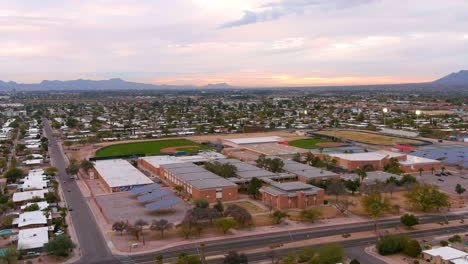 drone footage of tucson arizona with sports fields in foreground