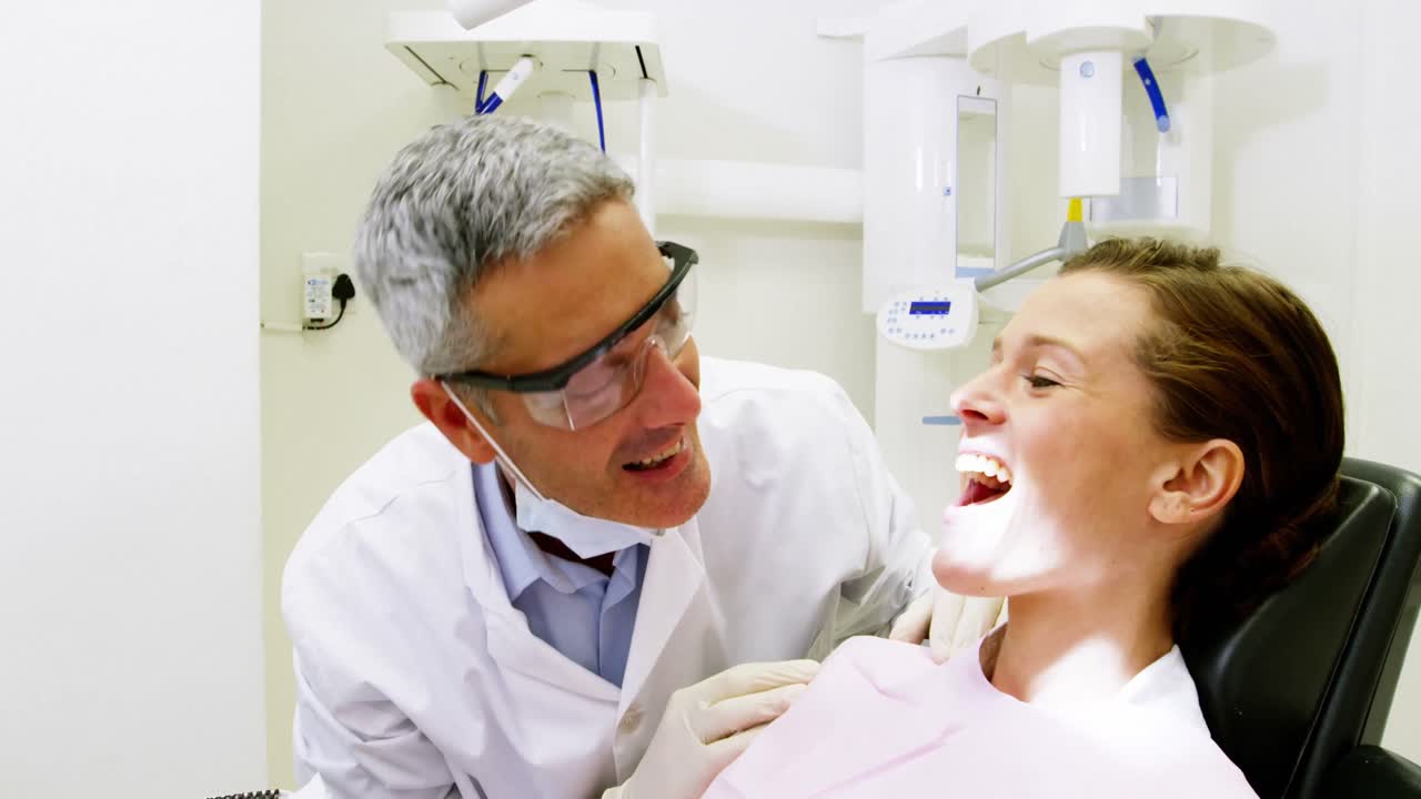 Dentist examining a patient