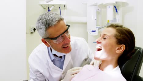 Dentist-examining-a-patient