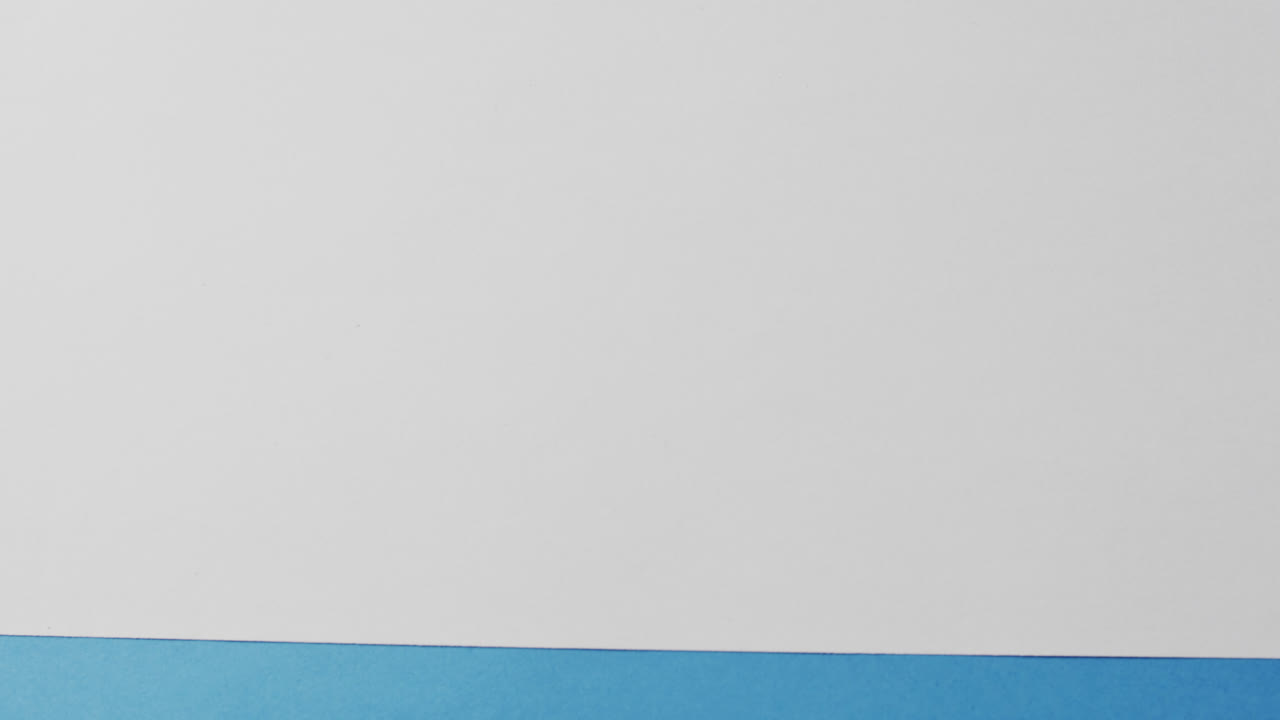 Close up of blank and blue cards with copy space in slow motion