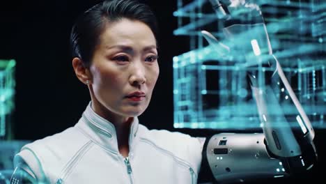 a skilled engineer utilizes state-of-the-art robotics to design and manipulate virtual architectural models in a cutting-edge laboratory environment.