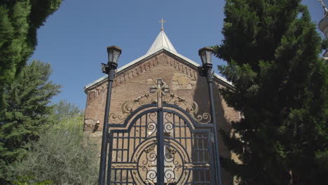 an amazing low angle view of the 12th-century georgian orthodox church in the lurji monastery, or "blue church", in tbilisi georgia