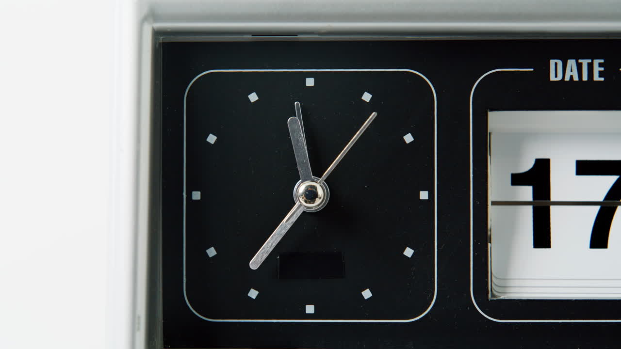 Metal hands ticking clock measuring time flowing closeup. Thin seconds arrow