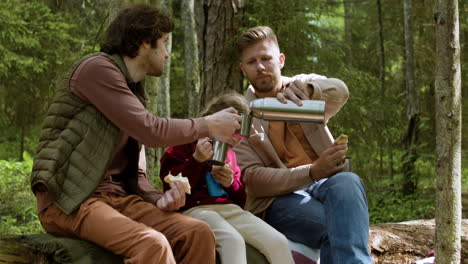 family having picnic at the forest