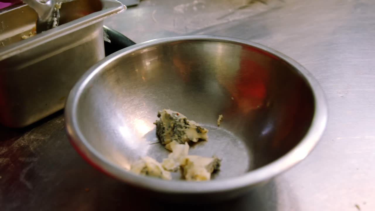 Male baker preparing pasta in bakery shop 4k